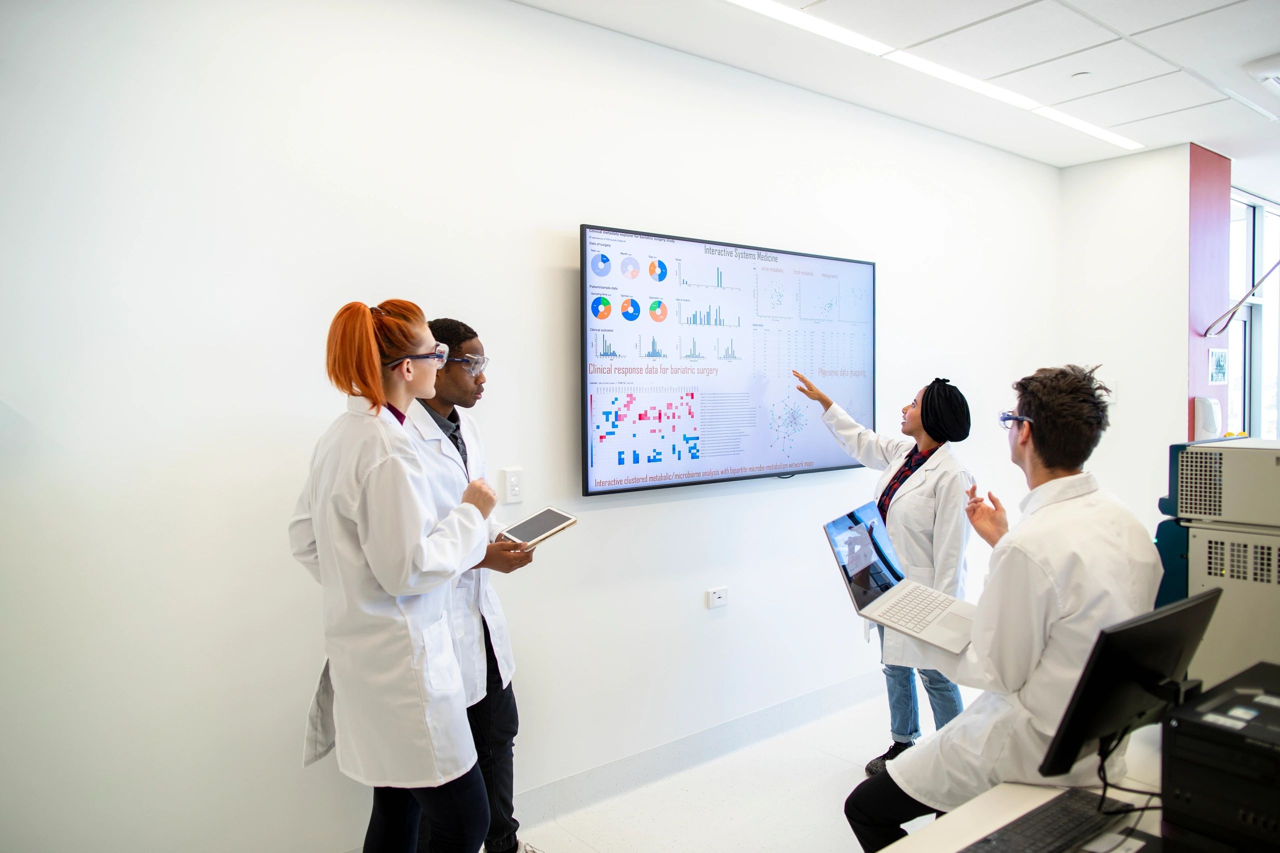 Students and researchers collaborating in a laboratory setting